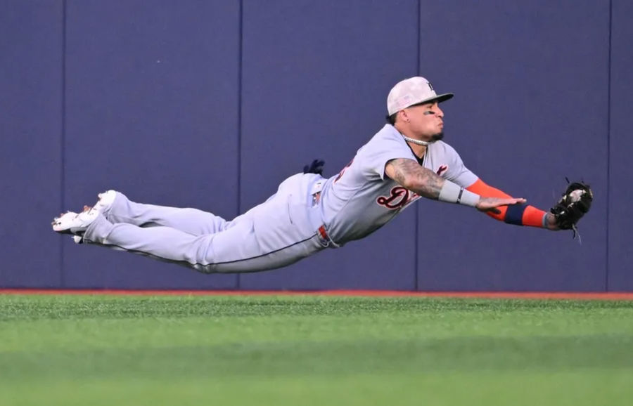 May 16, 2025; Toronto, Ontario, CAN; Detroit Tigers center fielder Javier Baez (28) catches a fly ball hit by Toronto Blue Jays right fielder Nathan Lukes (not pictured) in the second inning at Rogers Centre. Mandatory Credit: Dan Hamilton-Imagn Images