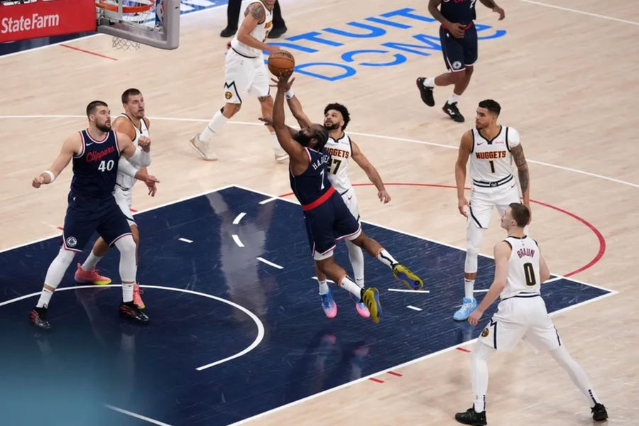 May 1, 2025; Inglewood, California, USA; LA Clippers guard James Harden (1) shoots the ball against Denver Nuggets guard Jamal Murray (27) during game six of first round for the 2025 NBA Playoffs at Intuit Dome. Mandatory Credit: Kirby Lee-Imagn Images