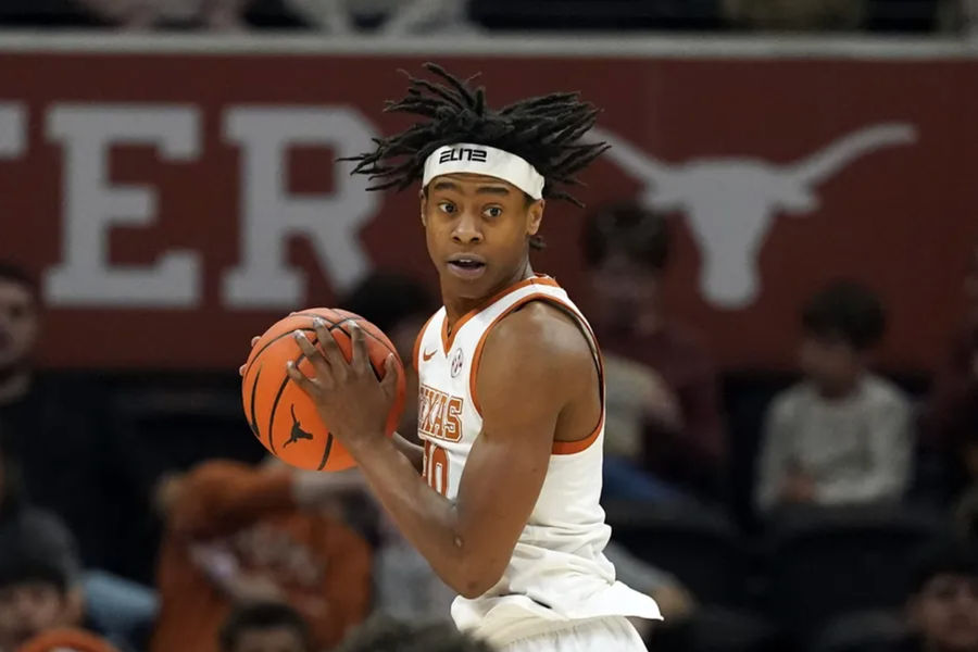 Dec 29, 2024; Austin, Texas, USA; Texas Longhorns guard Tre Johnson (20) grabs a rebound during the first half against the Northwestern State Demons at Moody Center. Mandatory Credit: Scott Wachter-Imagn Images