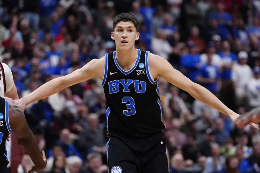 Mar 22, 2025; Denver, CO, USA; Brigham Young Cougars guard Egor Demin (3) reacts against the Wisconsin Badgers during the second half in the second round of the NCAA Tournament at Ball Arena. Mandatory Credit: Ron Chenoy-Imagn Images