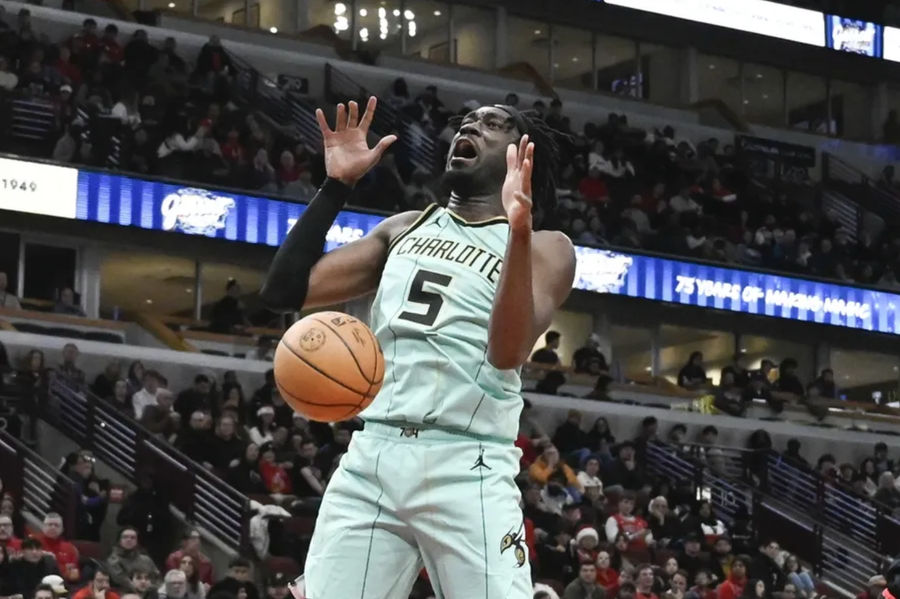 Dec 13, 2024; Chicago, Illinois, USA; Charlotte Hornets center Mark Williams (5) dunks the ball against the Chicago Bulls during the second half at the United Center. Mandatory Credit: Matt Marton-Imagn Images