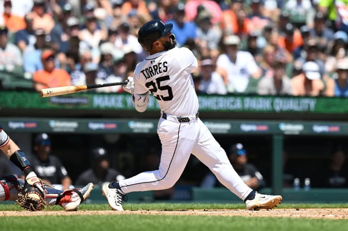 Jun 28, 2025; Detroit, Michigan, USA; Detroit Tigers second baseman Gleyber Torres (25) hits a two-run home run against the Minnesota Twins in the fourth inning at Comerica Park. Mandatory Credit: Lon Horwedel-Imagn Images