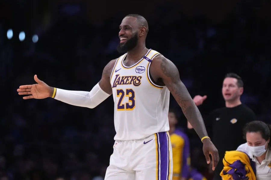 Dec 15, 2024; Los Angeles, California, USA; Los Angeles Lakers forward LeBron James (23) reacts in the first half against the Memphis Grizzlies at Crypto.com Arena. Mandatory Credit: Kirby Lee-Imagn Images