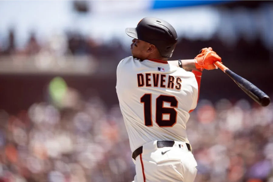 Jun 21, 2025; San Francisco, California, USA; San Francisco Giants designated hitter Rafael Devers (16) follows the flight of his two-run home run against the Boston Red Sox during the third inning at Oracle Park. Mandatory Credit: D. Ross Cameron-Imagn Images