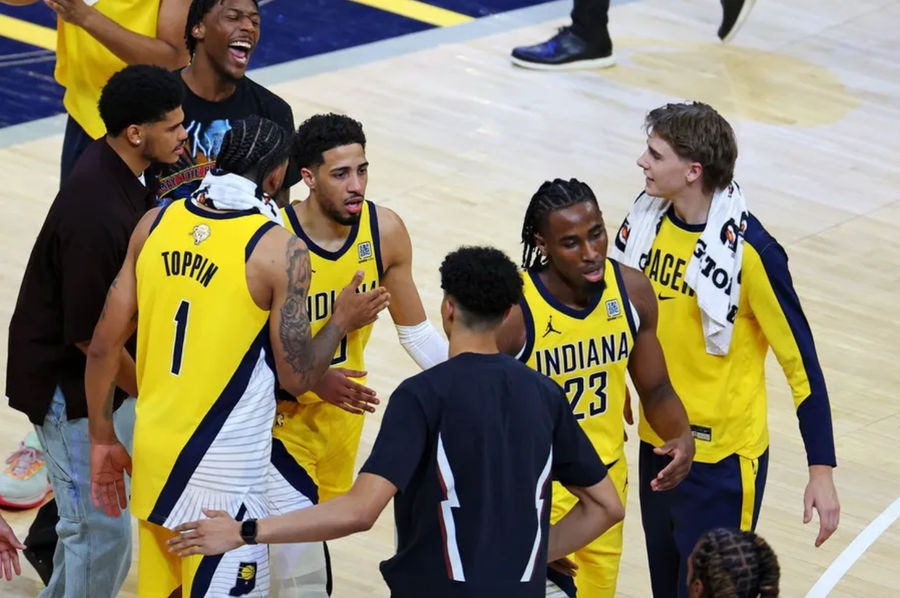 Jun 11, 2025; Indianapolis, Indiana, USA; Indiana Pacers guard Tyrese Haliburton (0) celebrates with his bench during the fourth quarter against the Oklahoma City Thunder in game three of the 2025 NBA Finals at Gainbridge Fieldhouse. Mandatory Credit: Trevor Ruszkowski-Imagn Images