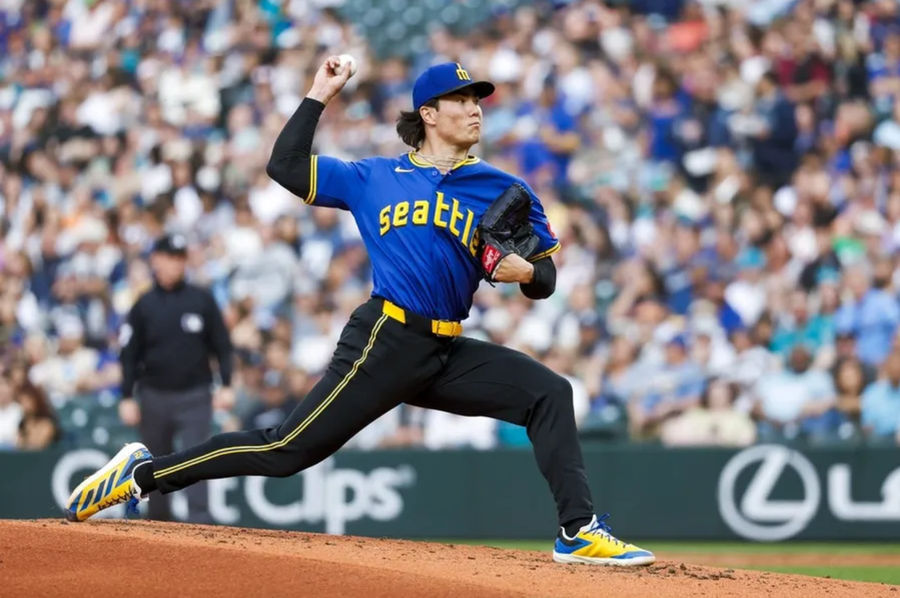 May 30, 2025; Seattle, Washington, USA; Seattle Mariners starting pitcher Bryan Woo (22) throws against the Minnesota Twins during the fourth inning at T-Mobile Park. Mandatory Credit: Joe Nicholson-Imagn Images