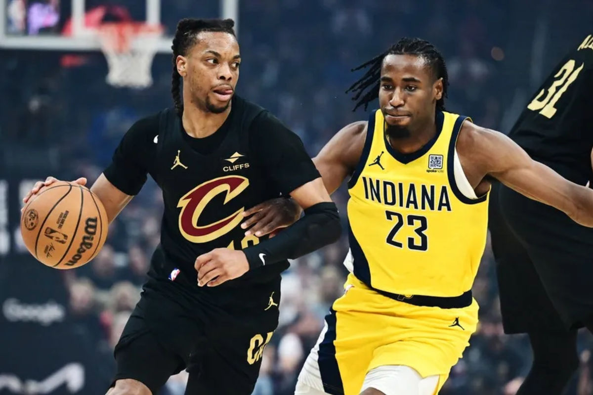 May 13, 2025; Cleveland, Ohio, USA; Cleveland Cavaliers guard Darius Garland (10) drives to the basket against Indiana Pacers forward Aaron Nesmith (23) during the first quarter of game five of the second round for the 2025 NBA Playoffs at Rocket Arena. Mandatory Credit: Ken Blaze-Imagn Images