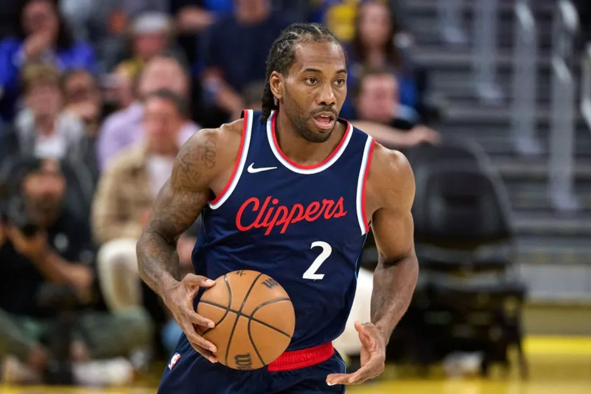 Apr 13, 2025; San Francisco, California, USA; LA Clippers forward Kawhi Leonard (2) brings the ball up court against the Golden State Warriors during the third quarter at Chase Center. Mandatory Credit: Robert Edwards-Imagn Images
