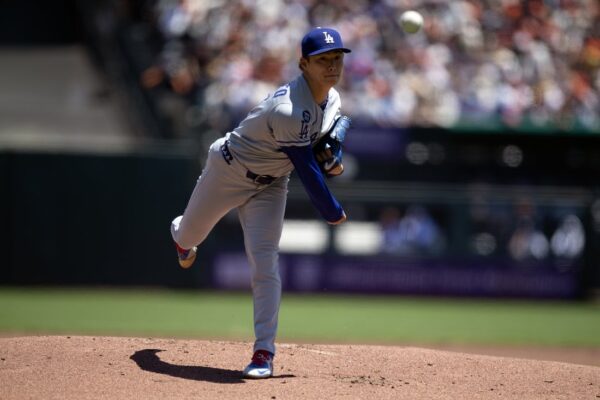 Dodgers’ two-out rally puts away rival Giants in extras
