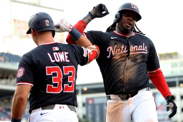 Josh Bell, Daylen Lile power Nationals past Reds