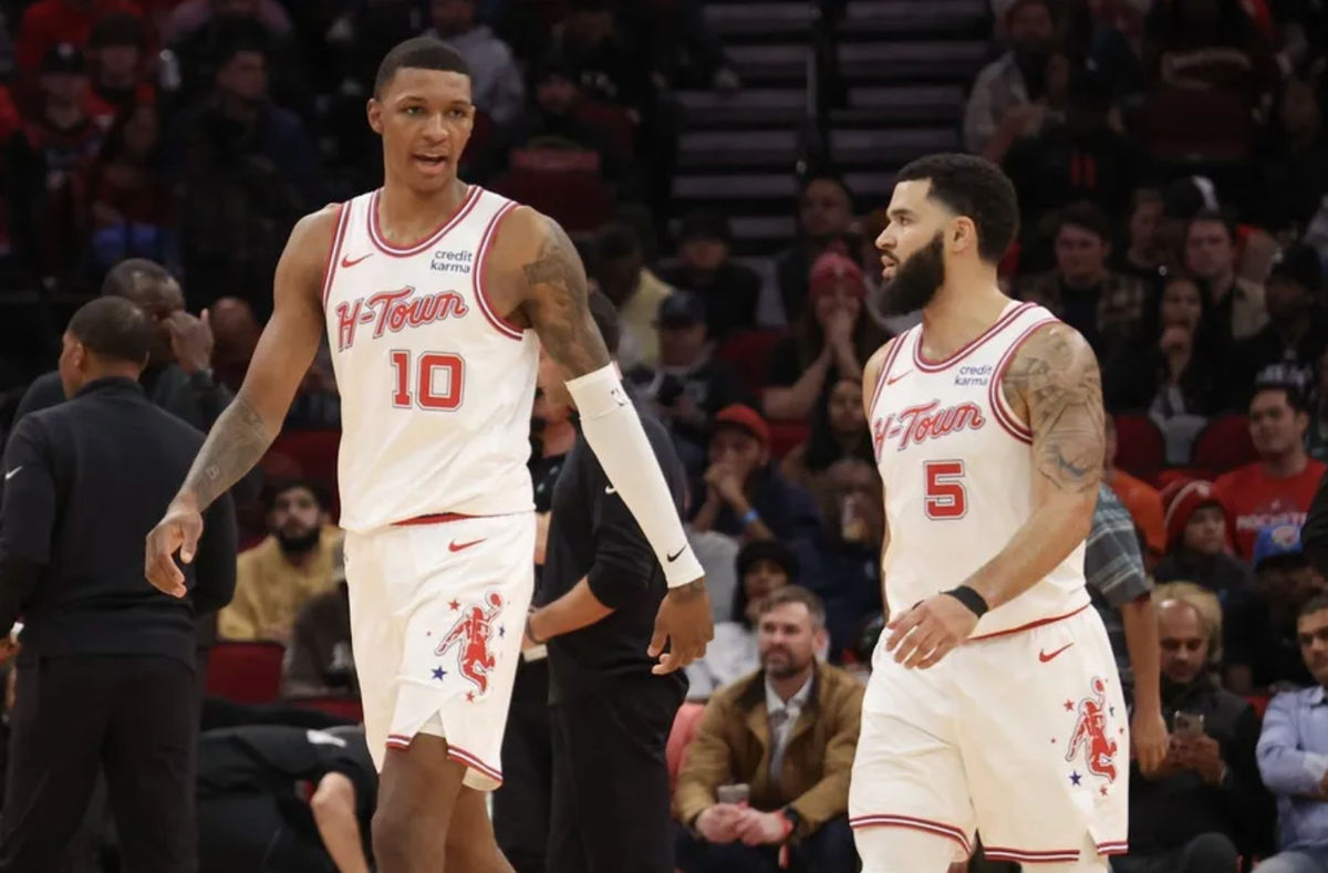 Dec 6, 2023; Houston, Texas, USA; Houston Rockets forward Jabari Smith Jr. (10) talks to guard Fred VanVleet (5) during a Oklahoma City Thunder timeout in the second quarter at Toyota Center. Mandatory Credit: Thomas Shea-Imagn Images