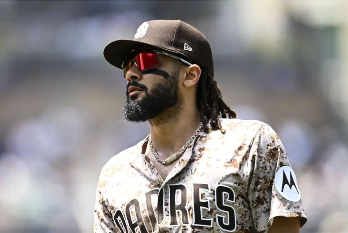 Jun 22, 2025; San Diego, California, USA; San Diego Padres outfielder Fernando Tatis Jr. (23) comes off the field during the third inning against the Kansas City Royals at Petco Park. Mandatory Credit: Denis Poroy-Imagn Images
