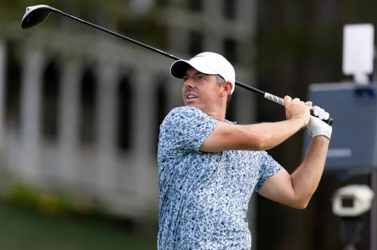 Jun 21, 2025; Cromwell, Connecticut, USA; Rory McIlroy plays his shot from the 18th tee during the third round of the Travelers Championship golf tournament. Mandatory Credit: Bill Streicher-Imagn Images