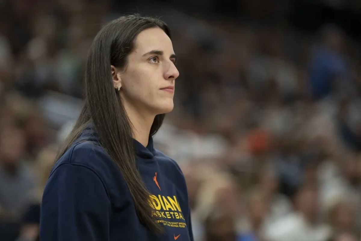 Jul 1, 2025; Minneapolis, Minnesota, USA; Indiana Fever guard Caitlin Clark (22) looks on against the Minnesota Lynx in the second half during the Commissioner's Cup final at Target Center. Mandatory Credit: Jesse Johnson-Imagn Images