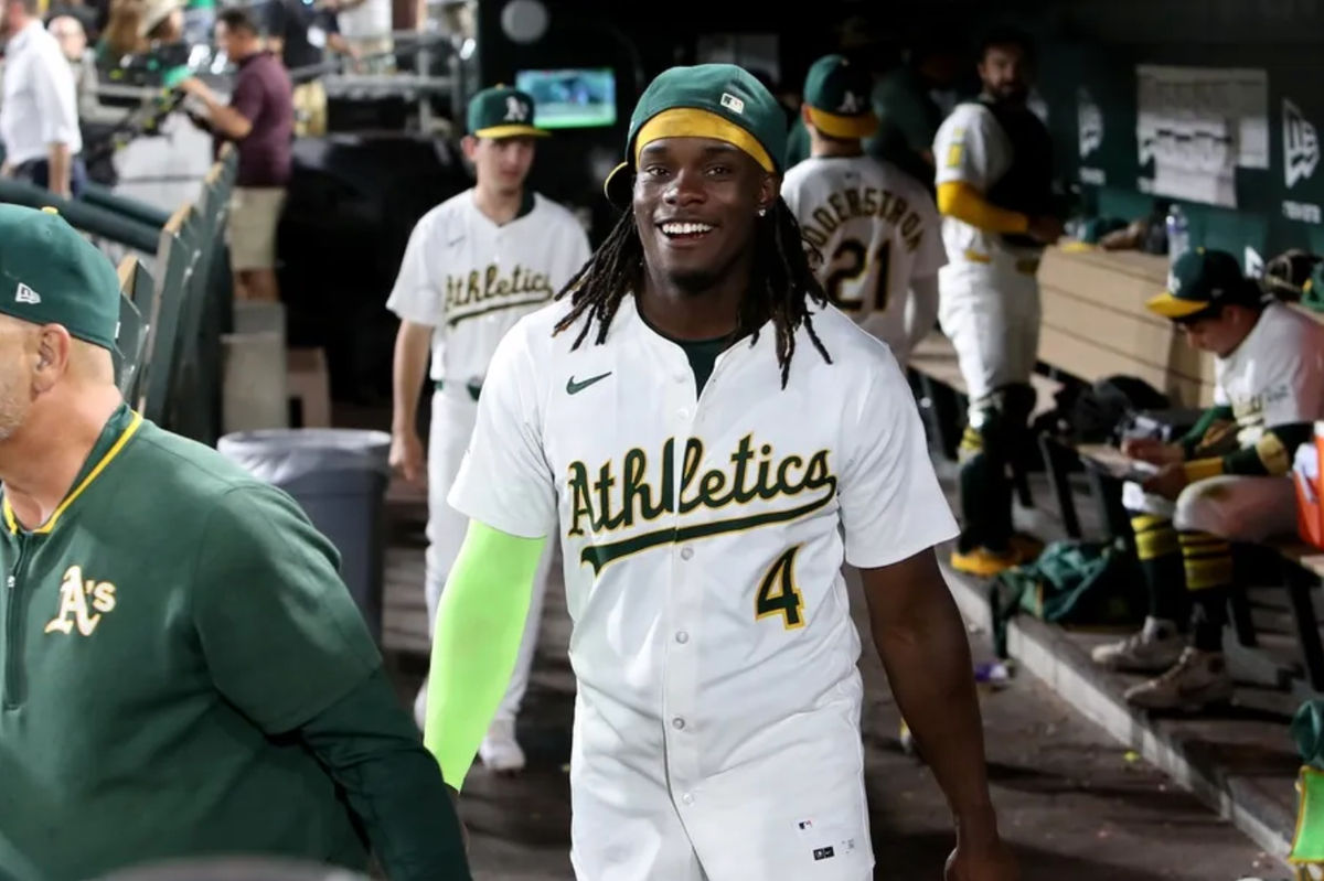 Jul 29, 2025; West Sacramento, California, USA; Athletics center fielder Lawrence Butler (4) heads back toward the clubhouse after defeating the Seattle Mariners 6-1 at Sutter Health Park. Mandatory Credit: Dennis Lee-Imagn Images
