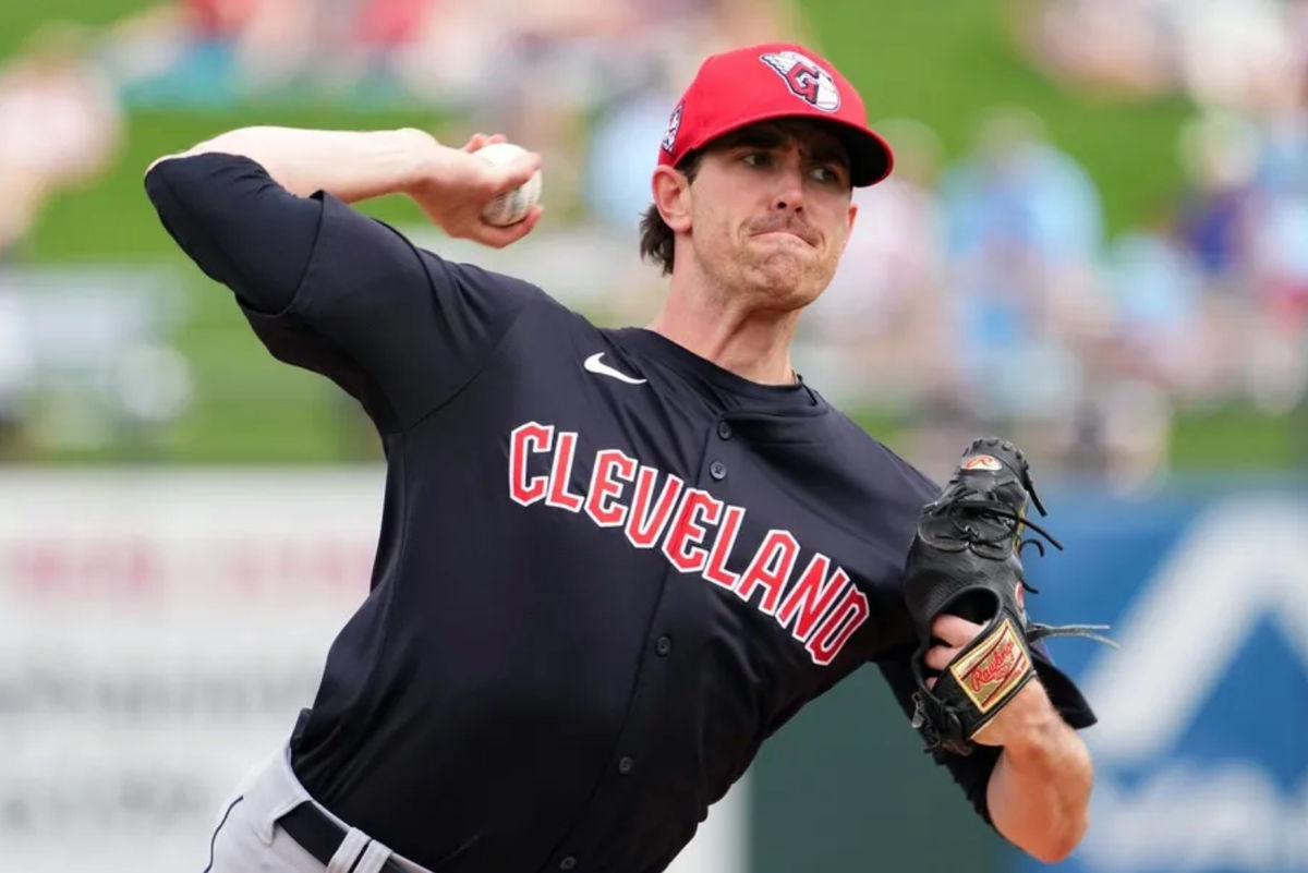 Mar 12, 2024; Surprise, Arizona, USA; Cleveland Guardians starting pitcher Shane Bieber (57) bats against the Texas Rangers during the second inning at Surprise Stadium. Mandatory Credit: Joe Camporeale-Imagn Images