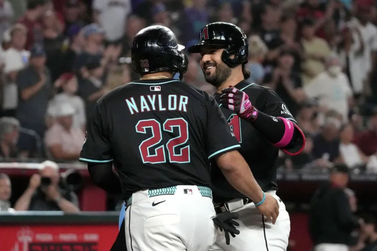 Jul 19, 2025; Phoenix, Arizona, USA; Arizona Diamondbacks third base Eugenio Suárez (28) celebrates with Josh Naylor (22) after hitting a two-run home run against the St. Louis Cardinals in the first inning at Chase Field. Mandatory Credit: Rick Scuteri-Imagn Images