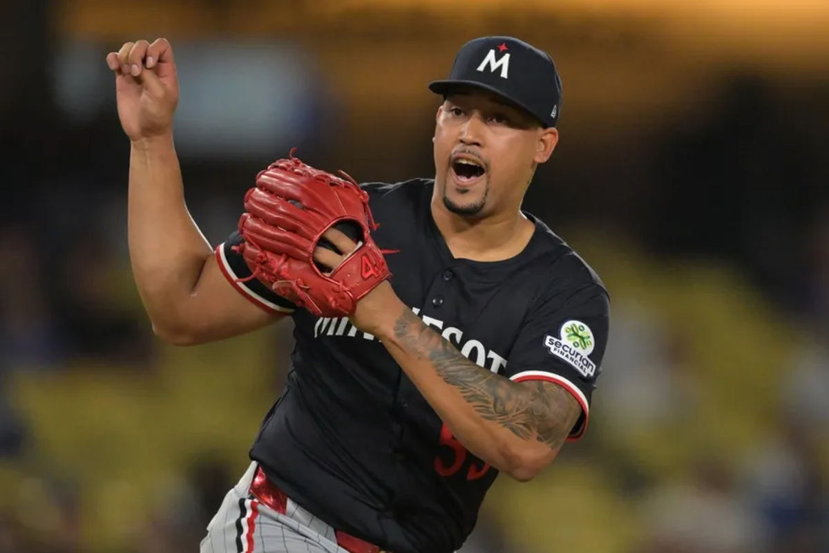 Jul 22, 2025; Los Angeles, California, USA; Minnesota Twins relief pitcher Jhoan Duran (59) reacts after the final out of the ninth inning against the Los Angeles Dodgers at Dodger Stadium. Mandatory Credit: Jayne Kamin-Oncea-Imagn Images
