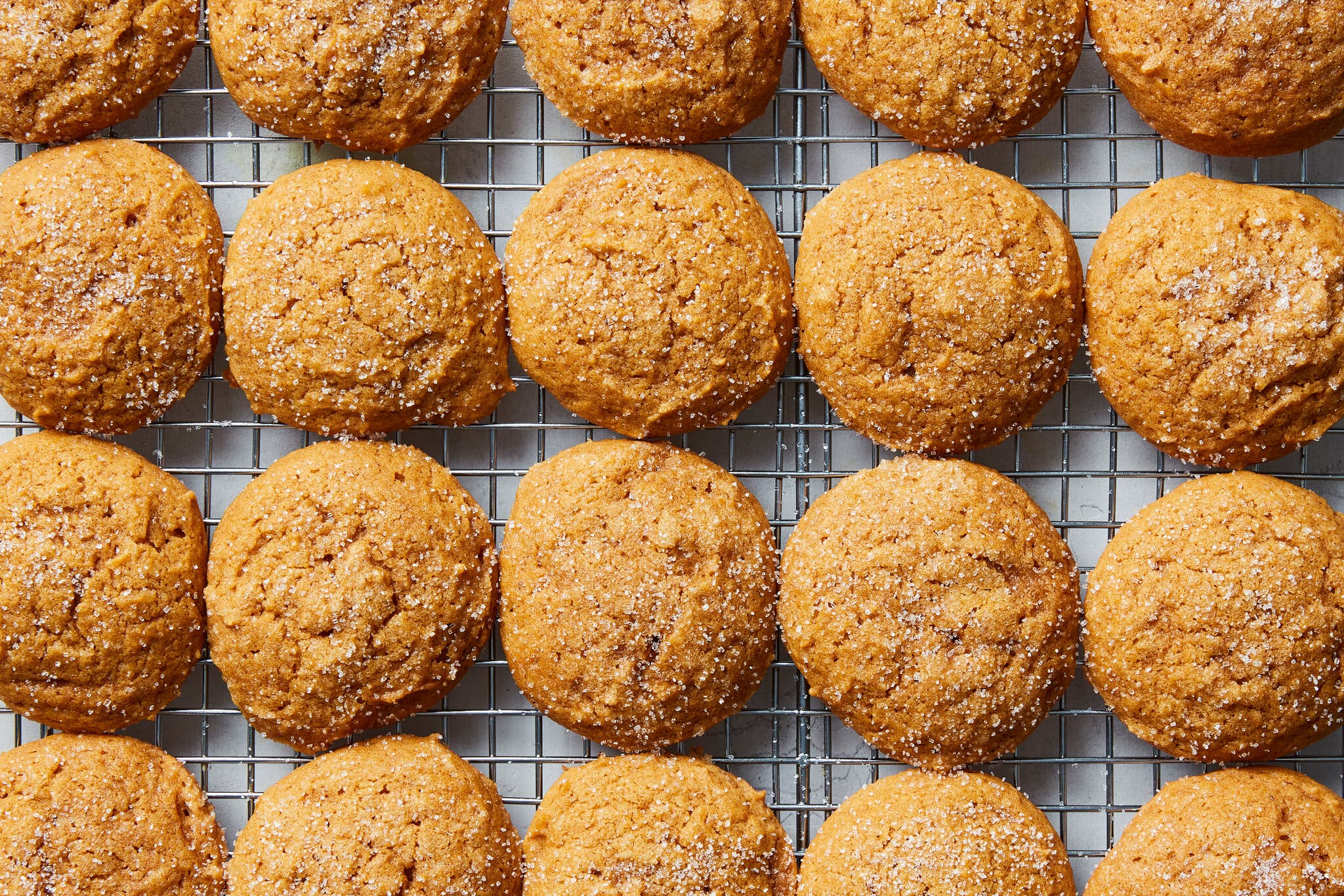 An overhead shot of pumpkin cookies on a cooling rack.